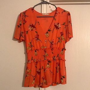 I am selling a Ember Rose blouse.